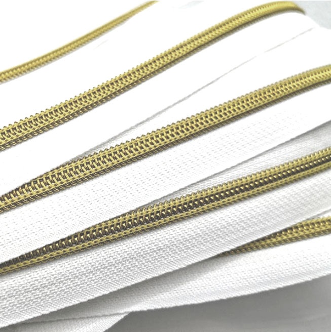 [contfbg] Cremallera continua fina (3mm) efecto metal (Blanco - Gold)